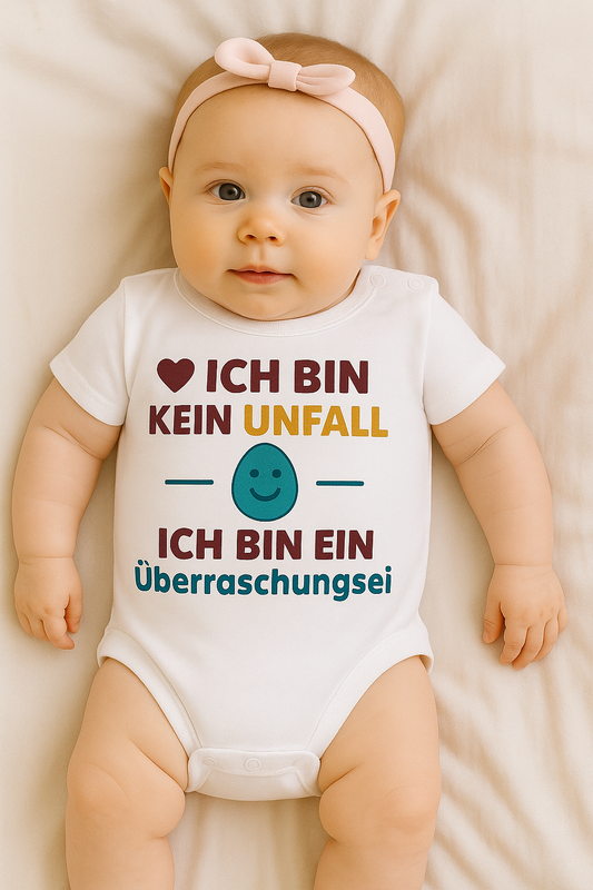Babybody “ICH BIN KEIN UNFALL ICH BIN EIN Überraschungsei„– Süßer Strampler aus 100% Baumwolle